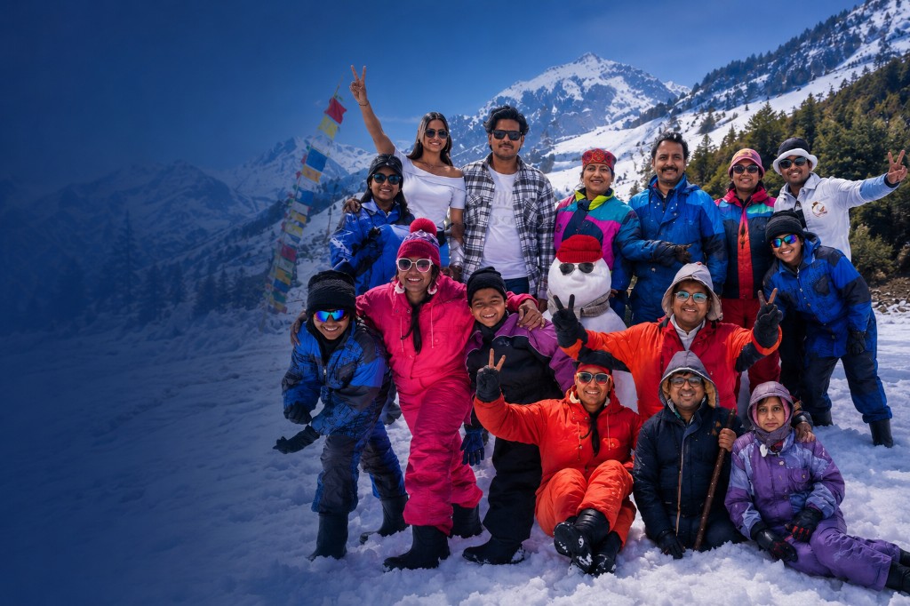 Group of happy travelers with Go Stride Adventures in the mountains